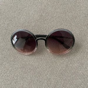 Green and pink round sunglasses